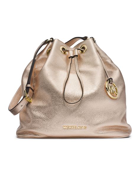 michael kors gold drawstring purse|Michael Kors drawstring front grommets.